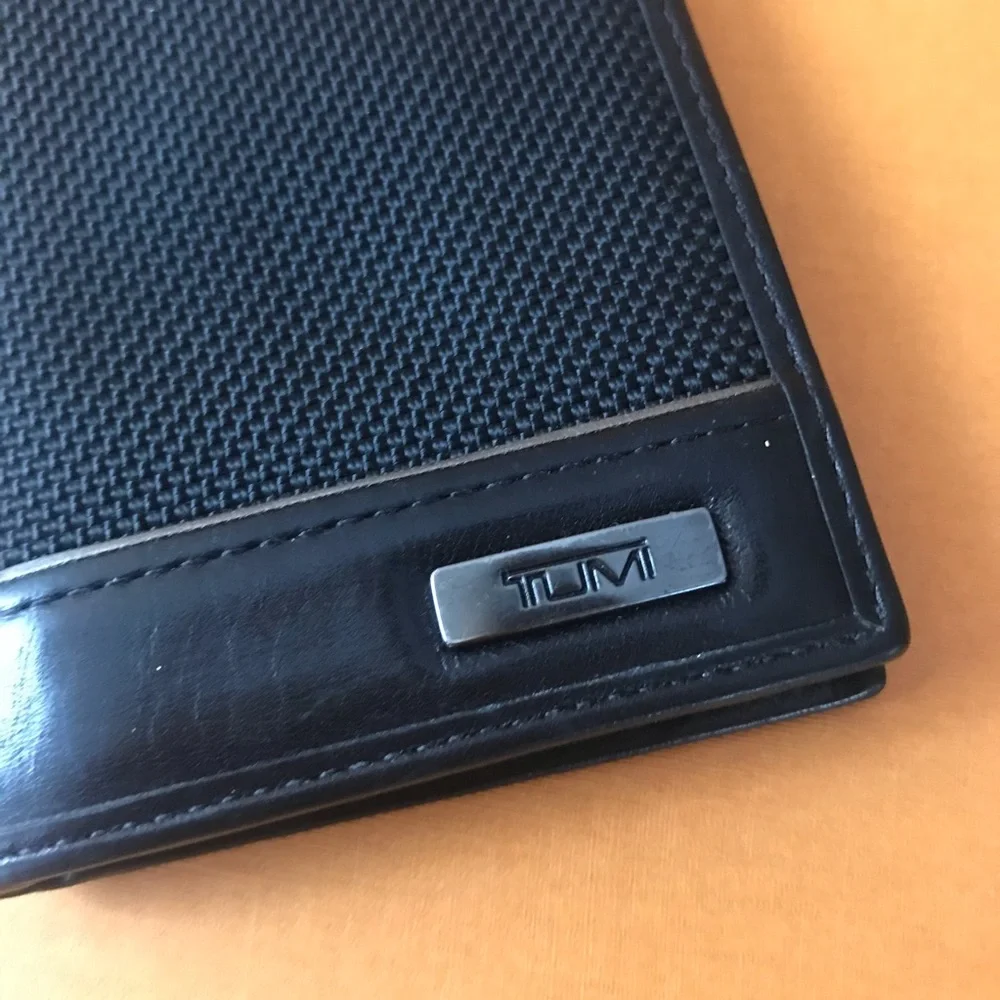 Tumi black‎ foldable wallet